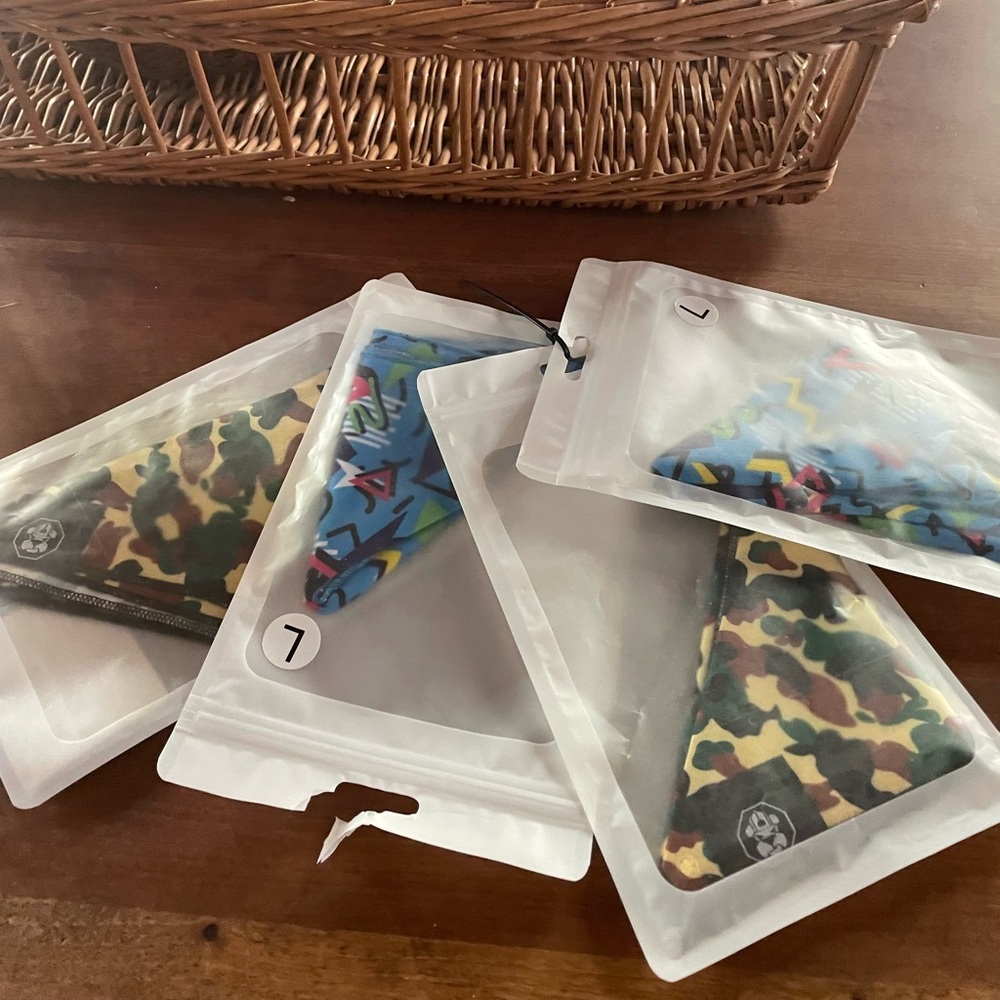 Bundle of 4 large dog bandanas.